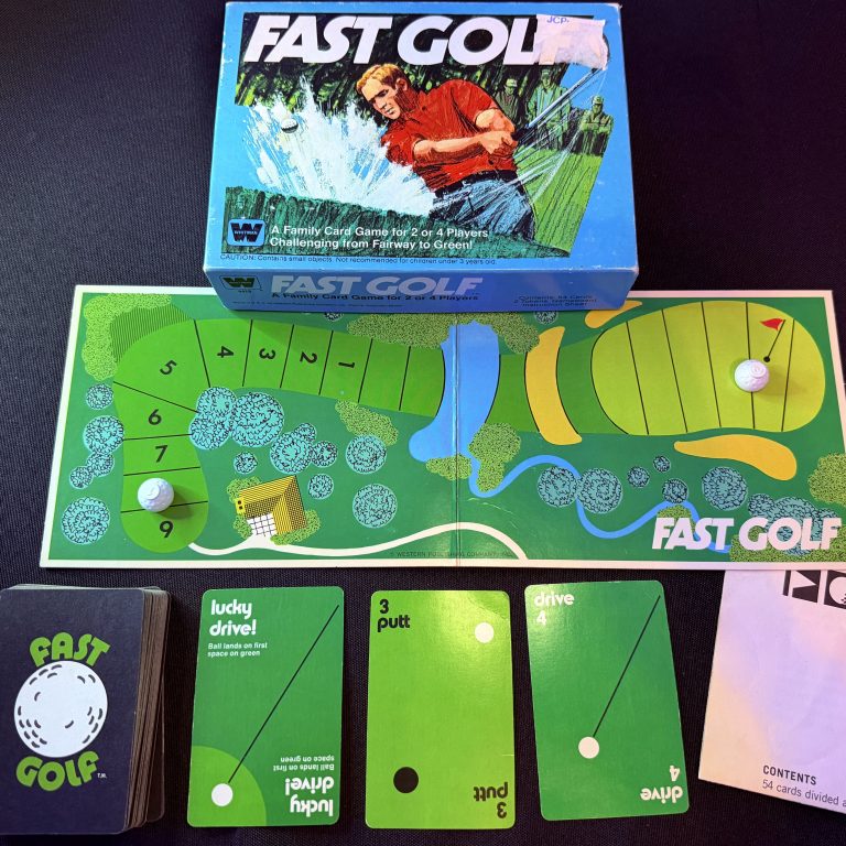 Fast Golf with deck of cards front and back, game board and game pieces.