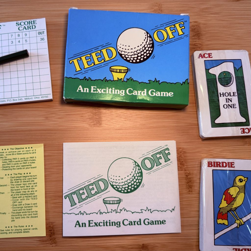 Teed Off Golf Card Game on table.
