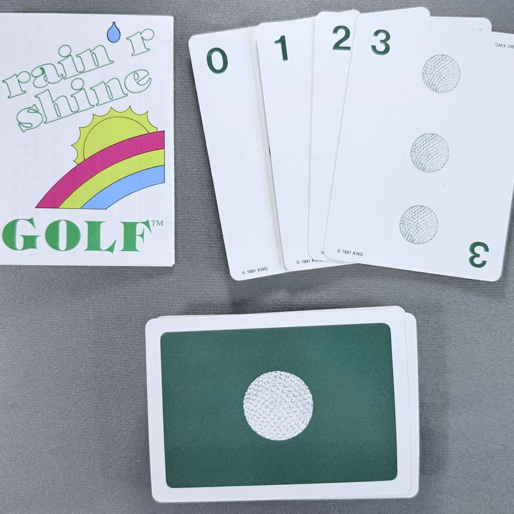 rain 'r shine golf instructions, cards and 3 card showing 1991