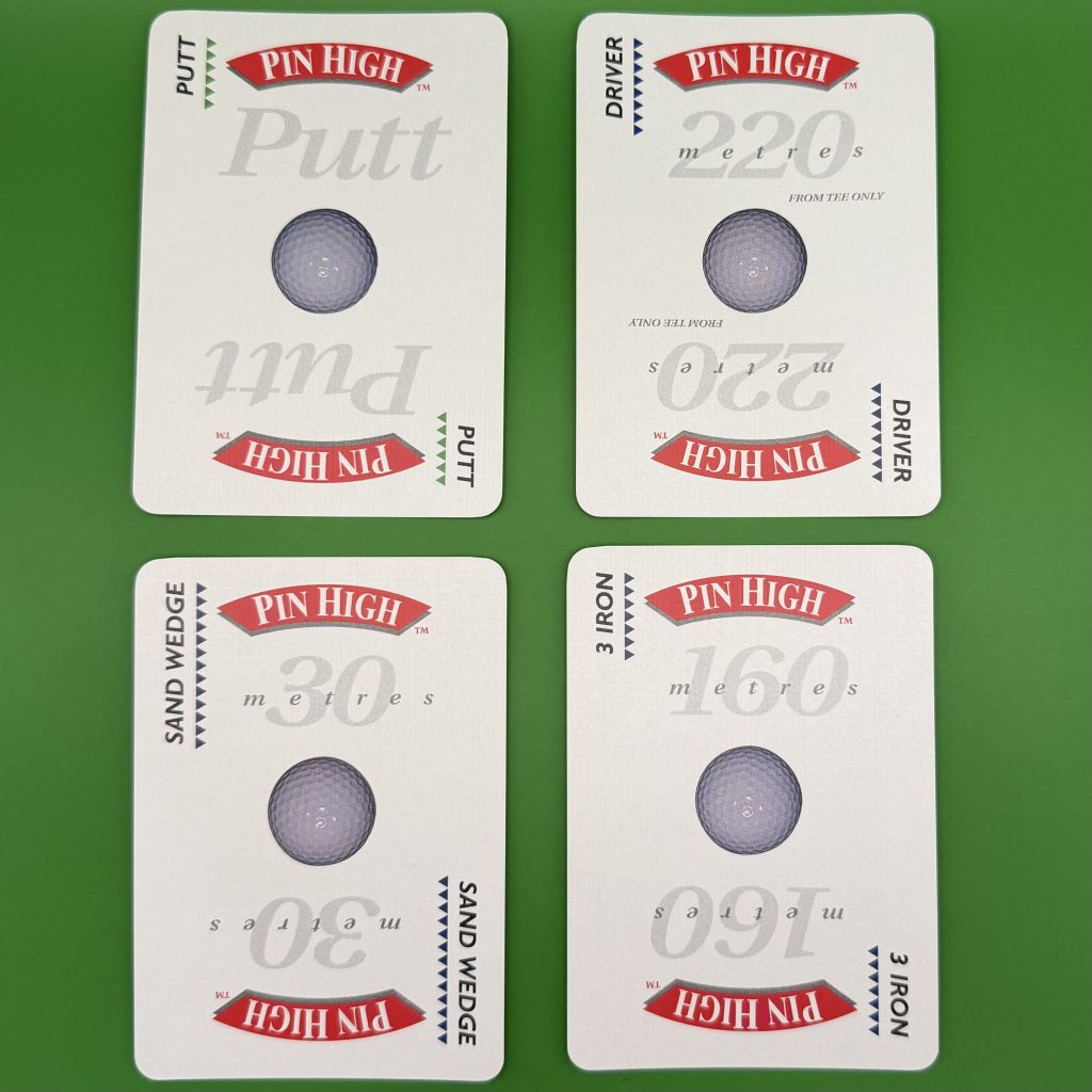 Pin High Four Cards laid out on green background