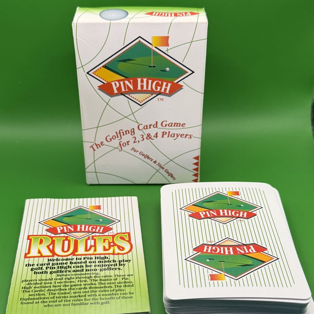 Pin High card box and cards laid out on green background